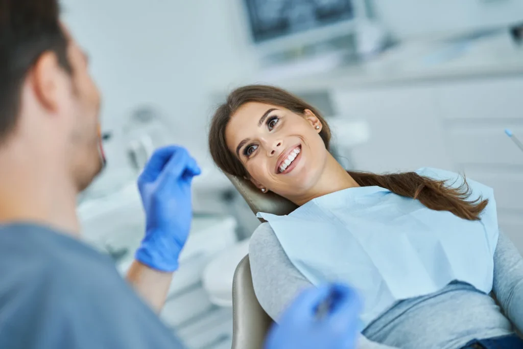 Dentist consulting with a patient about filling versus crown treatment options