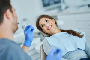 Dentist consulting with a patient about filling versus crown treatment options